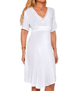 vestito estivo da donna Tarifa con dettagli in pizzo, vestito da spiaggia leggero da annodare, mini abito con maniche corte 08.VER22.042 BLC. Bianco