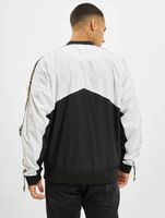 vsct Coach - Cortavientos con cinta del logotipo original