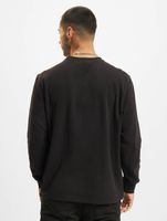 Pull ras du cou ajusté minimaliste vsct noir