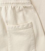 Pantalón deportivo unisex de lujo Sporty & Rich, estilo Yankees Serif, color nude/azul