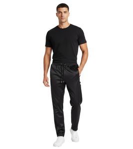 Pantaloni da tuta plissettati da uomo Han Kjobenhavn, neri