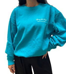 Sweat-shirt femme Sporty & Rich avec col rond, lettrage logo et imprimé dos turquoise