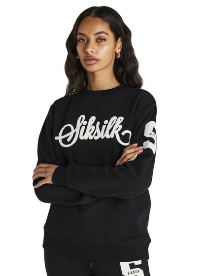 Suéter negro con logotipo universitario de Sik Silk