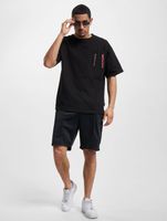 The Couture Club  Locker geschnittenes T-Shirt mit Taschendetail in Schwarz The Couture Club  Locker geschnittenes T-Shirt mit Taschendetail in Schwarz