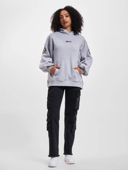 The Couture Club – Oversize-Kapuzenpullover mit Couture-Print und Puffärmeln, Grau meliert