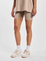 The Couture Club cycling shorts with graphic label and detail in beige