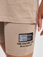 The Couture Club cycling shorts with graphic label and detail in beige