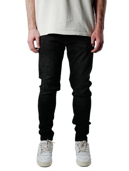 Vaqueros ajustados rotos premium UNEFFECTED negros