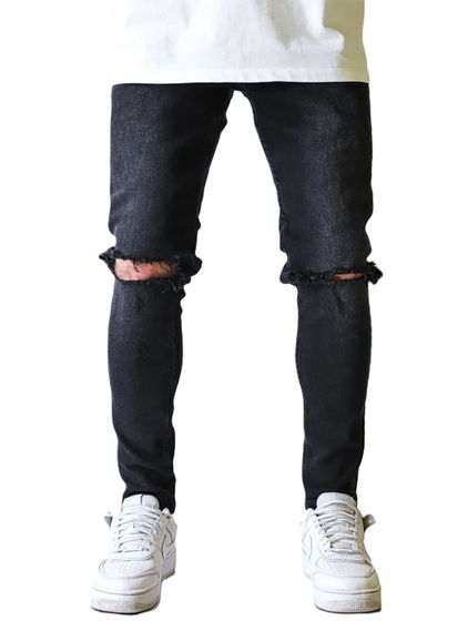 Vaqueros ajustados rotos premium UNEFFECTED negros
