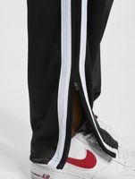 Pantalones de entrenamiento Dmwu Evolution negros de UNFAIR ATHLETICS
