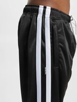 Pantalones de entrenamiento Dmwu Evolution negros de UNFAIR ATHLETICS