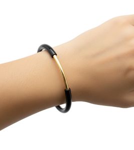 Modern Calvin Klein Women's Bangle, Black Bracelet with Gold-Tone Center Link, Bracelet KJ5FBF2001 Black/Gold