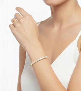 Modernes Calvin Klein Damen Armband mit Perlen Edelstahl-Armband Arm-Schmuck Größe XS KJAKJD1401 Gold
