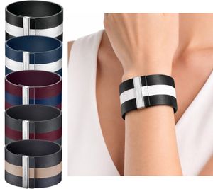 Trendy Calvin Klein women's genuine leather bracelet with a wide contrast stripe. Bracelet size XS (15cm) KJ9K in black, navy, red, or anthracite.