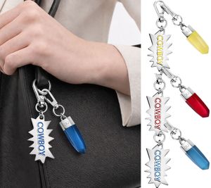 Cool Calvin Klein Downtown Charm Set: Stainless Steel Pendants with Contrasting Resin and COWBOY Logo - Bag Accessories - 7 x 1.3 cm - Yellow, Red, or Blue