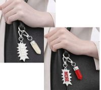 Ensemble de breloques Calvin Klein Downtown : Pendentifs en acier inoxydable avec résine contrastante et logo « MORE » - Accessoires de sac - 7 x 1,3 cm - Argent/Blanc ou Argent/Rouge