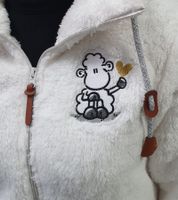 Comfortable sheepworld women's teddy fleece jacket with embroidered design. Cozy jacket with stand-up collar. Sweatshirt jacket in white or gray.