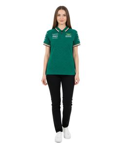 Polo femme Aston Martin Formule 1 avec logo de l'écurie sur la poitrine et logos des sponsors sur les manches, 100 % coton vert (réf. 701229256 001)