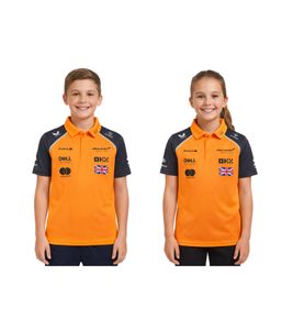 Polo infantil del equipo McLaren Lando Norris de Fórmula 1 con logotipos de patrocinadores, manga corta, color naranja (TJ5318)