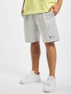 Versatili pantaloni da uomo Karl Kani con coulisse e tasche, in cotone 350 g/m², colore grigio.