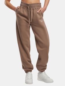 Pantalones modernos de mujer Karl Kani de algodón, color marrón.