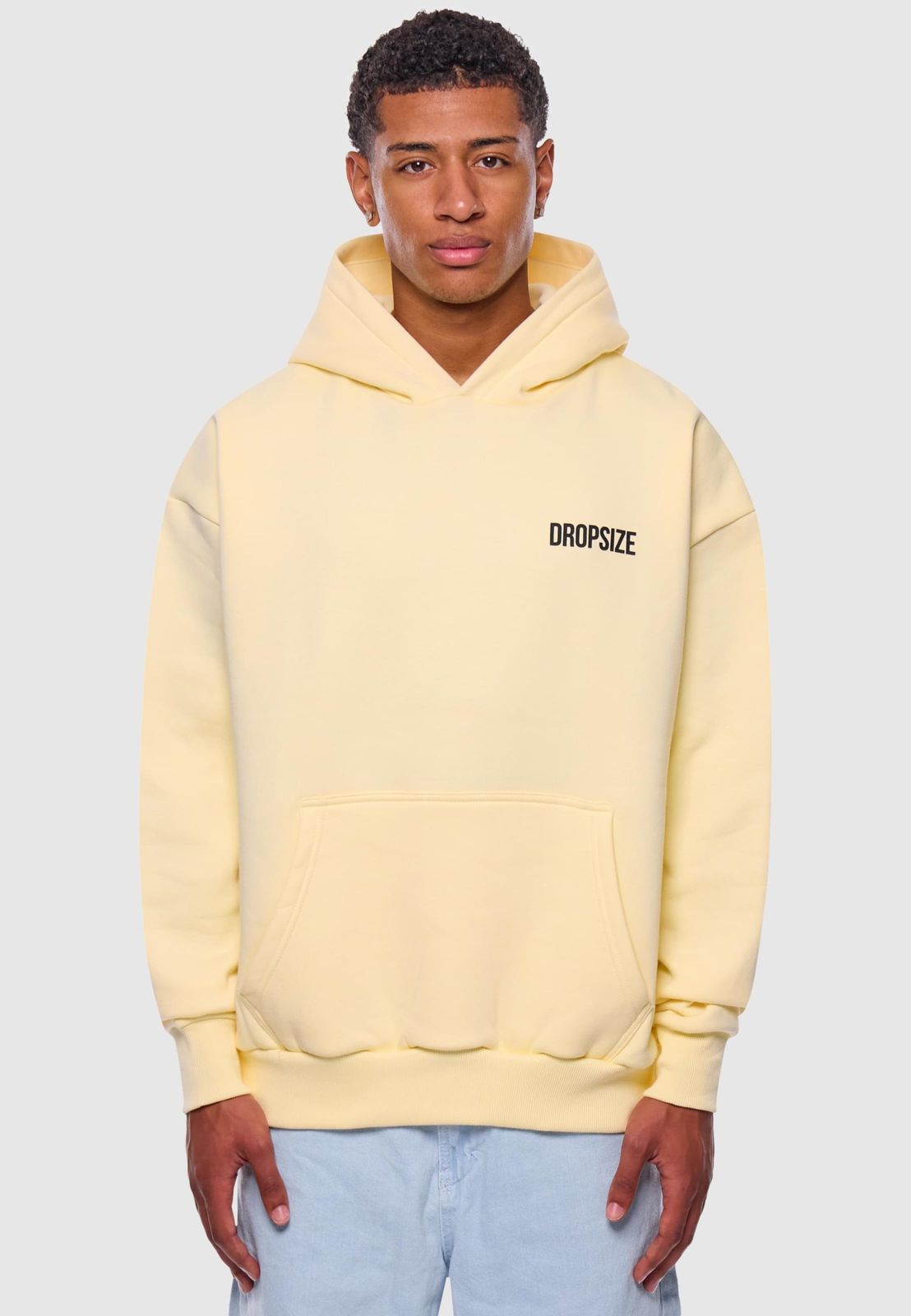 Felpa con cappuccio da uomo morbida e oversize, in cotone, di colore giallo.