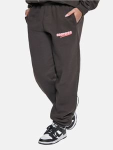 Pantalones modernos de mujer de corte holgado con puños acanalados, de algodón, color negro.