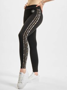 Pantalones elásticos versátiles de algodón para mujer de adidas, color negro.