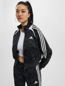 Chaqueta funcional adidas para mujer con cremalleras y bolsillos, color negro.