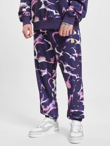 Pantalones vaqueros Just Rhyse cómodos para hombre con bolsillos con cordón ajustable, de algodón, color morado.