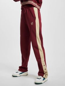Pantalon Rocawear confortable pour femme, en coton rouge, avec cordon de serrage et poches.