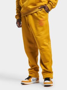 Pantalones casuales de hombre Rocawear de algodón, color naranja.