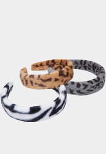 Diadema unisex Casual Urban Classics en blanco, gris y beige.