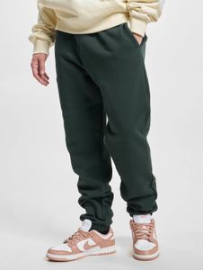 Jean homme Urban Classics confortable, avec cordon de serrage et poches, 460 g/m² coton, vert