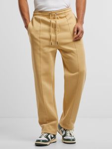 Pantalones de hombre URBAN CLASSICS modernos con puños elásticos acanalados, 330 g/m², color beige.