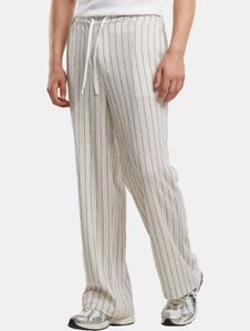 Comfortable Urban Classics men's jeans with stretch, drawstring, and pockets, ecru-white