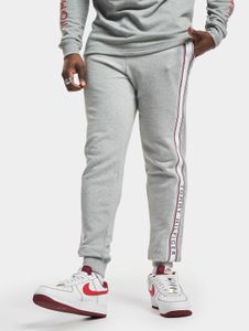 Elegantes vaqueros elásticos para hombre de Tommy Hilfiger con cordón ajustable y confeccionados en algodón, color gris.