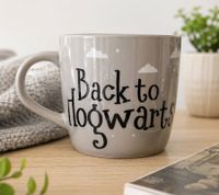 Taza de porcelana de 300 ml con asa en forma de corazón, diseño "Hogwarts Express" o "Back to Hogwarts", disponible en rosa o gris.