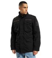 Veste de terrain Brandit M65 Giant, robuste et élégante, idéale pour la mi-saison. Veste en coton avec capuche, référence B3101, coloris noir ou bleu marine.