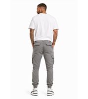 Comfortable URBAN CLASSICS men's cargo trousers made of pure cotton (320 g/m²) – ideal for everyday wear; available in grey, beige, khaki, or brown