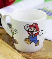 Caja de regalo de Super Mario con 9 artículos para fans: 4 vasos, 1 taza de porcelana, 3 loncheras y 1 tabla de desayuno