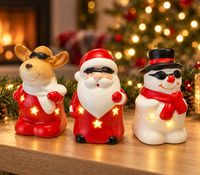 Set of 6 Christmas LED Figures – Santa Claus, Reindeer, and Snowman; warm white light; 3 assorted colorful designs Random design (approx. 10 cm); batteries included.