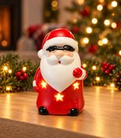 Set of 6 Christmas LED Figures – Santa Claus, Reindeer, and Snowman; warm white light; 3 assorted colorful designs Random design (approx. 10 cm); batteries included.