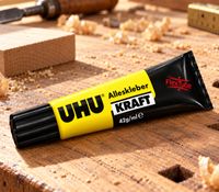 42g/ml UHU Alleskleber Kraft Flex  – transparenter, wasserfester Kraftkleber in flexibler Tube in Schwarz/Gelb