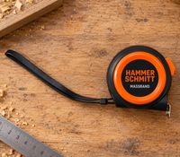 HAMMERSCHMITT 5-meter steel measuring tape with a convenient belt clip **B-stock – inspected** P8-HS-5STM2 in black/orange